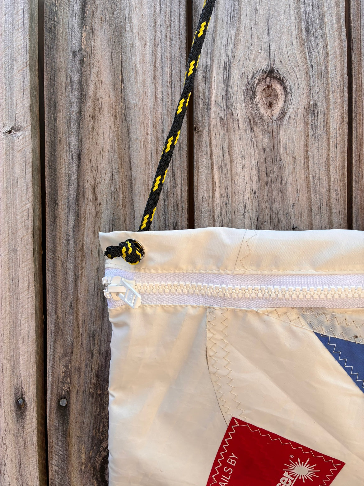 The Tender – Sailcloth Crossbody Messenger Bag | Laser/ILCA Radial Sail | Tack Patch, Cunningham Ring & Royalty Button | One of a Kind | Made from Real Sail